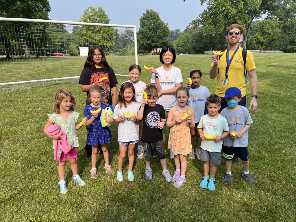 reliable and certified summer camp staff with a group of kids